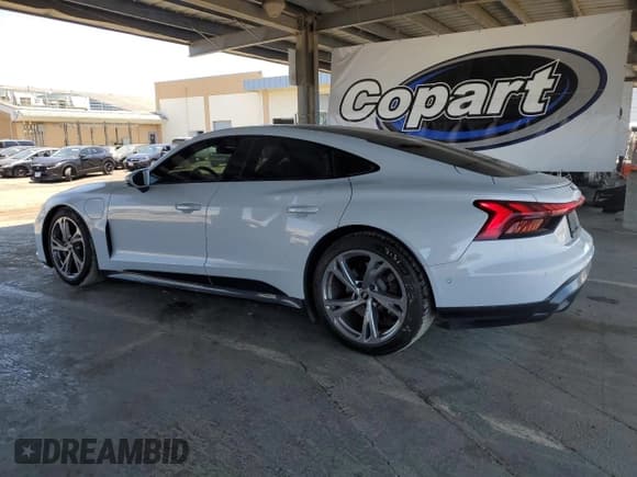 ✅ 2022 Audi e-tron GT Prestige • VIN: WAUDJBFW3N7004061 • Лот: 62935025. Опубликован ранее на Copart с пробегом 74 200 миль. Бесплатный доступ к архиву аукционных продаж из США и подробный отчёт об истории автомобиля на DreamBid. Изображение 2.