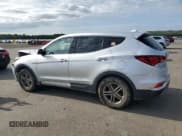 ✅ 2017 Hyundai Santa Fe 2.4L • VIN: 5XYZTDLB1HG392110 • Лот: 68240474. Опубликован ранее на Copart с пробегом 110 793 миль. Бесплатный доступ к архиву аукционных продаж из США и подробный отчёт об истории автомобиля на DreamBid. Изображение 2.