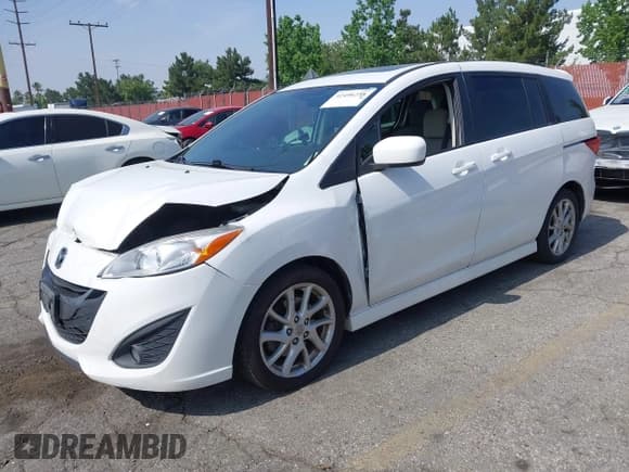 ✅ 2012 Mazda 5 Touring • VIN: JM1CW2CL2C0125776 • Lot: 42496258. Wystawiony na IAAI z przebiegiem 130 522 mil. Bezpłatny archiwum sprzedaży aukcyjnych z USA i szczegółowy raport historii pojazdu na DreamBid. Zdjęcie 2.
