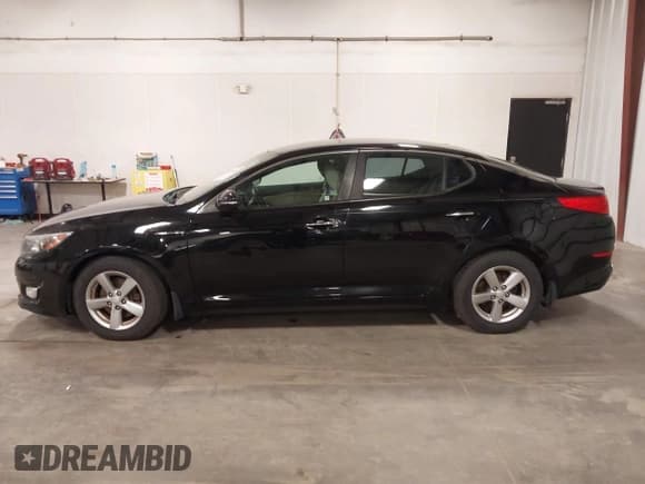 ✅ 2014 Kia Optima LX • VIN: 5XXGM4A77EG351516 • Lot: 43639933. Listed on IAAI with 157,494 mi. Free auction sales archive from the USA and detailed vehicle history report at DreamBid. Image 14.