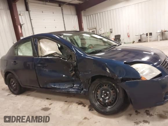 ✅ 2009 Nissan Sentra S FE+ • VIN: 3N1AB61E89L666618 • Лот: 42317924. Опубликован ранее на IAAI с пробегом 91 076 миль. Бесплатный доступ к архиву аукционных продаж из США и подробный отчёт об истории автомобиля на DreamBid. Изображение 6.