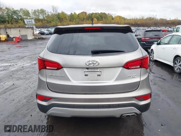 ✅ 2018 Hyundai Santa Fe 2.4L • VIN: 5NMZTDLB2JH095519 • Лот: 43462708. Опубликован ранее на IAAI с пробегом 87 498 миль. Бесплатный доступ к архиву аукционных продаж из США и подробный отчёт об истории автомобиля на DreamBid. Изображение 16.