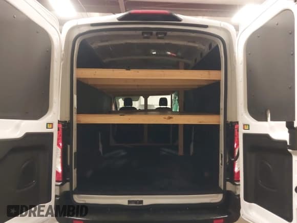 ✅ 2024 Ford Transit Cargo • VIN: 1FTBR2C81RKA01686 • Lot: 41100566. Listed on IAAI with 74,842 mi. Free auction sales archive from the USA and detailed vehicle history report at DreamBid. Image 17.