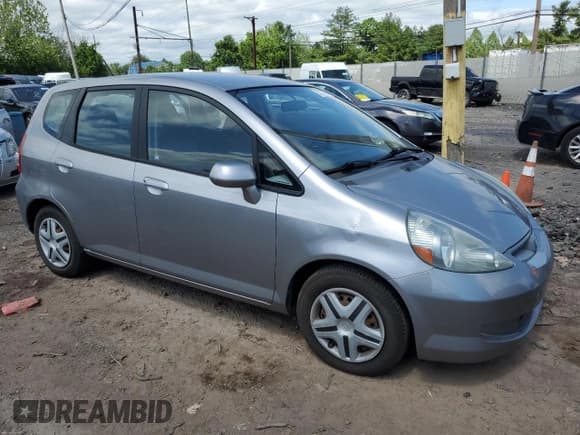 ✅ 2007 Honda Fit • VIN: JHMGD38457S043676 • Lot: 57217005. Listed on Copart with 208,480 mi. Free auction sales archive from the USA and detailed vehicle history report at DreamBid. Image 4.