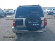 ✅ 2003 Suzuki XL7 Touring • VIN: JS3TX92V934102093 • Lot: 43710578. Listed on IAAI with 89,189 mi. Free auction sales archive from the USA and detailed vehicle history report at DreamBid. Image 16.