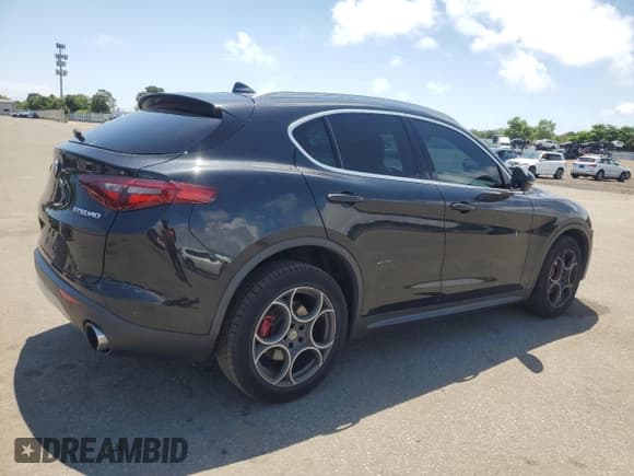✅ 2018 Alfa Romeo Stelvio • VIN: ZASFAKAN9J7B98154 • Lot: 64700895. Listed on Copart with 73,526 mi. Free auction sales archive from the USA and detailed vehicle history report at DreamBid. Image 3.