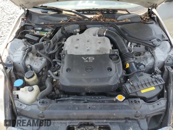 ✅ 2005 Nissan 350Z • VIN: JN1AZ34D85M608232 • Лот: 69145384. Опубликован ранее на Copart с пробегом 128 199 миль. Бесплатный доступ к архиву аукционных продаж из США и подробный отчёт об истории автомобиля на DreamBid. Изображение 11.