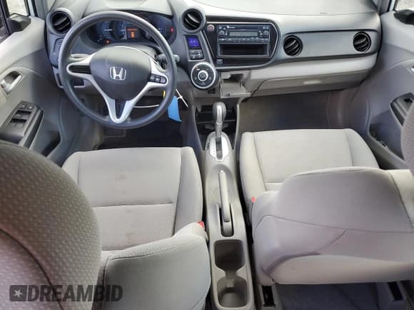 ✅ 2014 Honda Insight • VIN: JHMZE2H35ES002579 • Lot: 70114145. Listed on Copart with 124,514 mi. Free auction sales archive from the USA and detailed vehicle history report at DreamBid. Image 8.