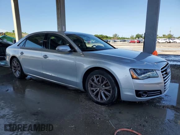 ✅ 2014 Audi A8 3.0T • VIN: WAURGAFD4EN006135 • Lot: 80755355. Wystawiony na Copart z przebiegiem 78 474 mil. Bezpłatny archiwum sprzedaży aukcyjnych z USA i szczegółowy raport historii pojazdu na DreamBid. Zdjęcie 4.