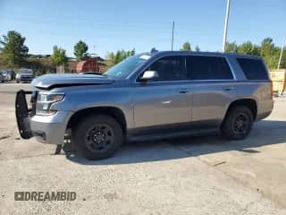 2020 Chevrolet Tahoe Commercial с VIN 1GNLCDEC8LR260345, выставлен на аукционе Copart как лот 72036875 с пробегом 76 320 миль миль и Списание • Salvage title. История ставок и продаж доступна на DreamBid. Изображение 1.
