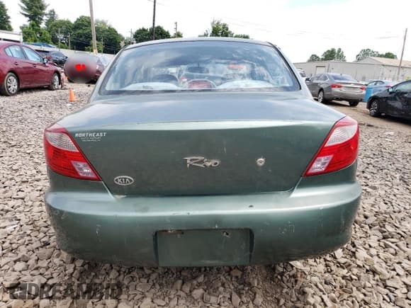 ✅ 2002 Kia Rio • VIN: KNADC123726158130 • Lot: 59104584. Listed on Copart with 60,553 mi. Free auction sales archive from the USA and detailed vehicle history report at DreamBid. Image 6.