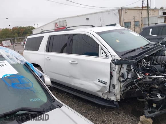 ✅ 2020 Chevrolet Suburban LT • VIN: 1GNSCHKCXLR225409 • Lot: 43545085. Listed on IAAI with 71,992 mi. Free auction sales archive from the USA and detailed vehicle history report at DreamBid. Image 14.