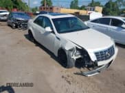 ✅ 2012 Cadillac CTS Premium • VIN: 1G6DS5E33C0121298 • Lot: 42845909. Listed on IAAI with 103,259 mi. Free auction sales archive from the USA and detailed vehicle history report at DreamBid. Image 1.