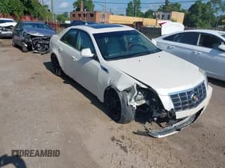 ✅ 2012 Cadillac CTS Premium • VIN: 1G6DS5E33C0121298 • Lot: 42845909. Listed on IAAI with 103,259 mi. Free auction sales archive from the USA and detailed vehicle history report at DreamBid. Image 1.