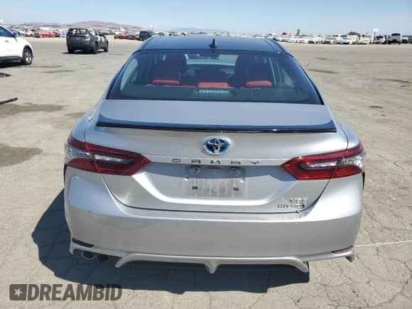 2021 Toyota Camry Hybrid XSE с VIN 4T1K31AK3MU021277, выставлен на аукционе Copart как лот 70713925 с пробегом 110 295 миль миль и Списание • Salvage title. История ставок и продаж доступна на DreamBid. Изображение 6.