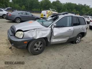 2006 Hyundai Santa Fe GLS z VIN KM8SC13EX6U099100, wystawiony jako Copart lot #56667845 z przebiegiem Nie podano mil oraz Szkoda całkowita • Salvage title. Historia ofert i sprzedaży dostępna na DreamBid. Obrazek 1.