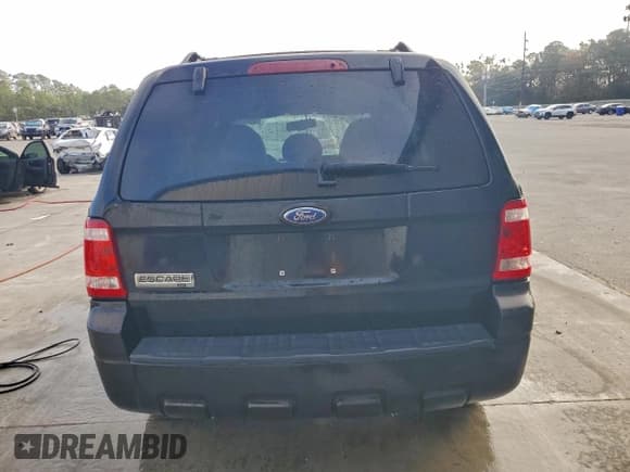 ✅ 2008 Ford Escape XLT • VIN: 1FMCU031X8KB05016 • Lot: 94292545. Listed on Copart with 215,658 mi. Free auction sales archive from the USA and detailed vehicle history report at DreamBid. Image 6.