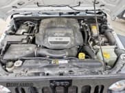 ✅ 2016 Jeep Wrangler Black Bear • VIN: 1C4AJWAG0GL104173 • Lot: 63565415. Wystawiony na Copart z przebiegiem 52 922 mil. Bezpłatny archiwum sprzedaży aukcyjnych z USA i szczegółowy raport historii pojazdu na DreamBid. Zdjęcie 11.