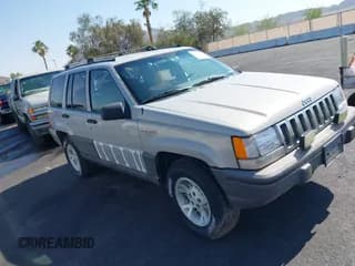 ✅ 1994 Jeep Grand Cherokee Laredo • VIN: 1J4GZ58S4RC325909 • Lot: 39580601. Listed on IAAI with 162,952 mi. Free auction sales archive from the USA and detailed vehicle history report at DreamBid. Image 1.