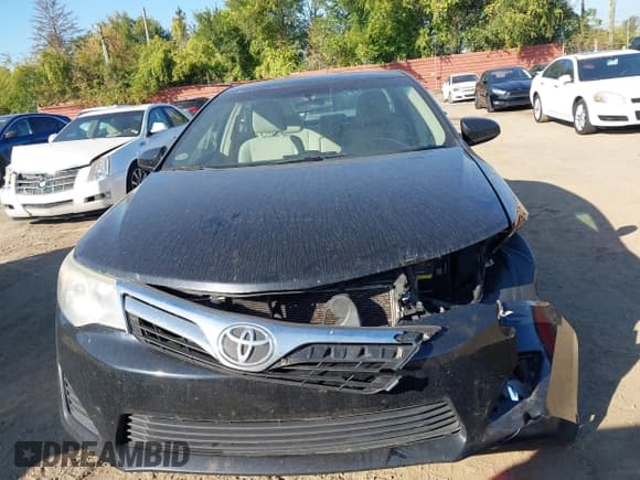 ✅ 2014 Toyota Camry XLE • VIN: 4T1BF1FK9EU461361 • Lot: 43409800. Listed on IAAI with 257,240 mi. Free auction sales archive from the USA and detailed vehicle history report at DreamBid. Image 12.