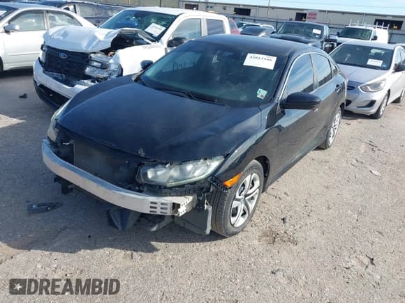 ✅ 2018 Honda Civic LX • VIN: 19XFC2F54JE028098 • Lot: 43813166. Wystawiony na IAAI z przebiegiem 91 023 mil. Bezpłatny archiwum sprzedaży aukcyjnych z USA i szczegółowy raport historii pojazdu na DreamBid. Zdjęcie 17.