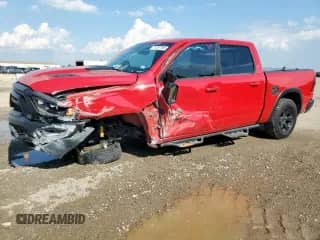 2021 Ram 1500 Rebel z VIN 1C6SRFLT4MN537414, wystawiony jako Copart lot #71257195 z przebiegiem 84 813 mil mil oraz Szkoda całkowita • Salvage title. Historia ofert i sprzedaży dostępna na DreamBid. Obrazek 1.