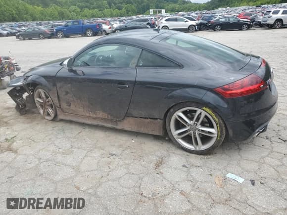 ✅ 2013 Audi TTS 2.0T Prestige • VIN: TRUK1AFK2D1013388 • Лот: 61302135. Опубликован ранее на Copart с пробегом 77 268 миль. Бесплатный доступ к архиву аукционных продаж из США и подробный отчёт об истории автомобиля на DreamBid. Изображение 2.