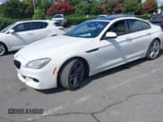 ✅ 2014 BMW 6 Series 650i • VIN: WBA6B2C56ED129672 • Lot: 42742121. Listed on IAAI with 95,754 mi. Free auction sales archive from the USA and detailed vehicle history report at DreamBid. Image 2.