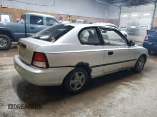 2002 Hyundai Accent with VIN KMHCF35G82U192732, listed as a Copart auction lot 85187074 with 224,194 mi miles and Clean title. Bid and sale history available at DreamBid. Image 3.