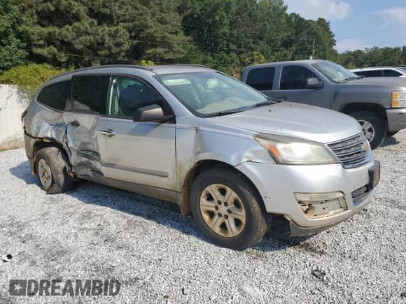 2013 Chevrolet Traverse LS with VIN 1GNKRFED2DJ249355, listed as a Copart auction lot 80835165 with 125,159 mi miles and Salvage title. Bid and sale history available at DreamBid. Image 4.