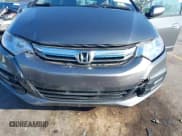 ✅ 2012 Honda Insight • VIN: JHMZE2H38CS006302 • Lot: 43194098. Listed on IAAI with 178,604 mi. Free auction sales archive from the USA and detailed vehicle history report at DreamBid. Image 6.