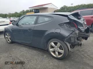 ✅ 2014 Hyundai Veloster • VIN: KMHTC6AD4EU216647 • Lot: 43772655. Wystawiony na Copart z przebiegiem 157 288 mil. Bezpłatny archiwum sprzedaży aukcyjnych z USA i szczegółowy raport historii pojazdu na DreamBid. Zdjęcie 2.