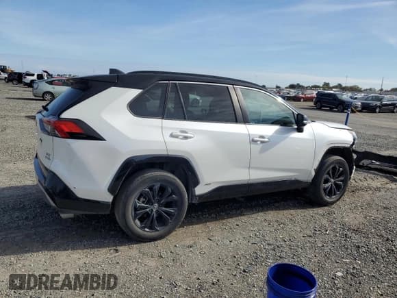 ✅ 2022 Toyota RAV4 Hybrid XSE • VIN: 4T3E6RFV6NU072139 • Лот: 90949815. Опубликован ранее на Copart с пробегом 183 183 миль. Бесплатный доступ к архиву аукционных продаж из США и подробный отчёт об истории автомобиля на DreamBid. Изображение 3.