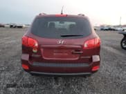 ✅ 2009 Hyundai Santa Fe GLS • VIN: 5NMSG13D29H283636 • Lot: 83018694. Listed on Copart with 274,921 mi. Free auction sales archive from the USA and detailed vehicle history report at DreamBid. Image 6.