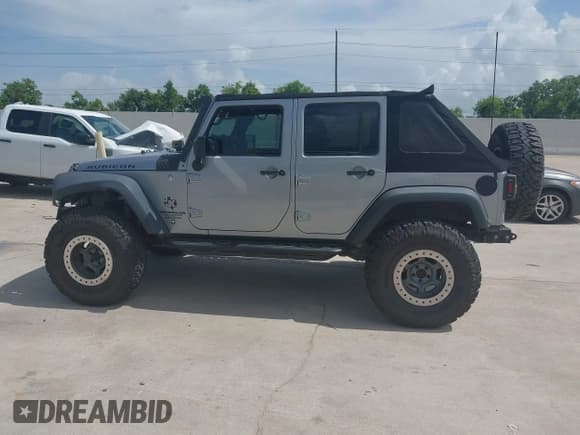 ✅ 2015 Jeep Wrangler Unlimited Rubicon Hard Rock • VIN: 1C4HJWFG1FL718588 • Lot: 42662414. Listed on IAAI with 84,087 mi. Free auction sales archive from the USA and detailed vehicle history report at DreamBid. Image 14.