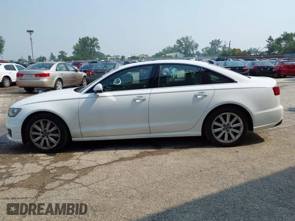 ✅ 2016 Audi A6 Premium Plus • VIN: WAUGFAFC9GN007351 • Lot: 42865007. Listed on IAAI with 124,550 mi. Free auction sales archive from the USA and detailed vehicle history report at DreamBid. Image 14.