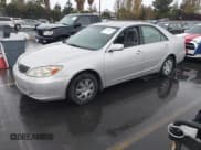 ✅ 2002 Toyota Camry LE • VIN: JTDBE32KX20094109 • Лот: 43704420. Опубликован ранее на IAAI с пробегом 164 801 миль. Бесплатный доступ к архиву аукционных продаж из США и подробный отчёт об истории автомобиля на DreamBid. Изображение 2.