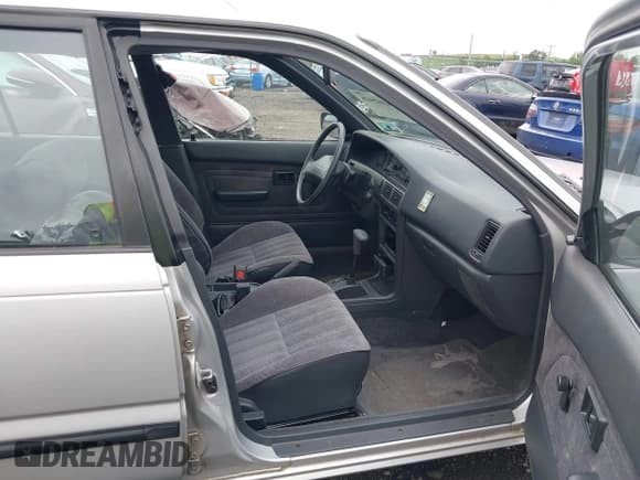 ✅ 1991 Toyota Corolla • VIN: 2T1AE94A6MC082910 • Лот: 43028426. Опубликован ранее на IAAI с пробегом 105 269 миль. Бесплатный доступ к архиву аукционных продаж из США и подробный отчёт об истории автомобиля на DreamBid. Изображение 5.