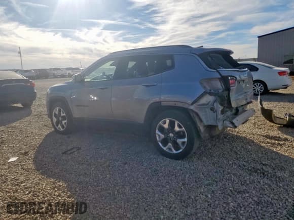 ✅ 2019 Jeep Compass Limited • VIN: 3C4NJCCBXKT788616 • Lot: 93014405. Listed on Copart with 85,799 mi. Free auction sales archive from the USA and detailed vehicle history report at DreamBid. Image 2.