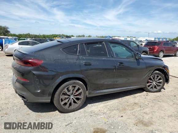 ✅ 2021 BMW X6 M50i • VIN: 5UXCY8C07M9E96742 • Lot: 51899215. Wystawiony na Copart z przebiegiem Nie podano. Bezpłatny archiwum sprzedaży aukcyjnych z USA i szczegółowy raport historii pojazdu na DreamBid. Zdjęcie 3.