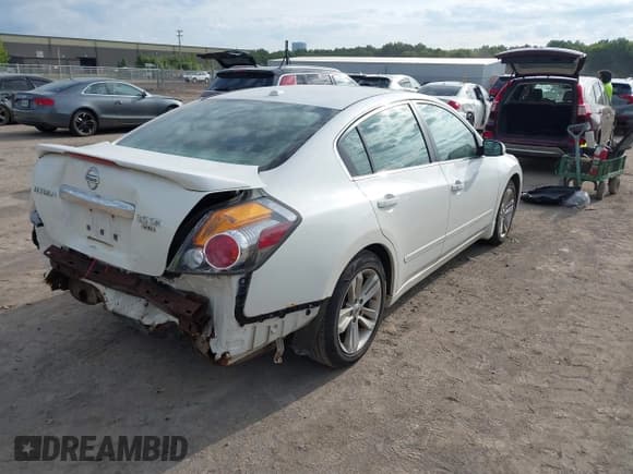 ✅ 2010 Nissan Altima SR • VIN: 1N4BL2AP8AN521503 • Lot: 43079703. Listed on IAAI with 186,638 mi. Free auction sales archive from the USA and detailed vehicle history report at DreamBid. Image 4.