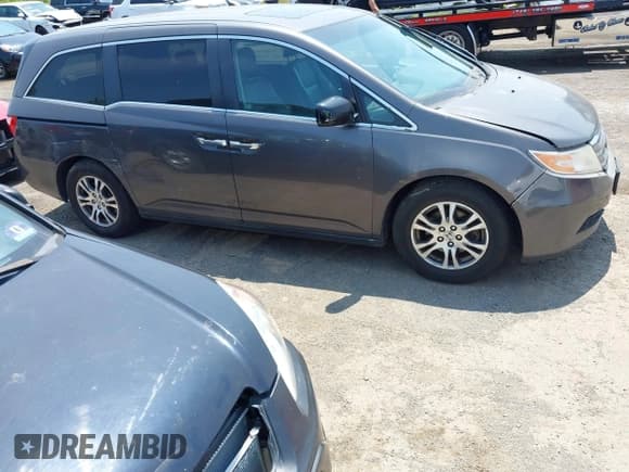 ✅ 2012 Honda Odyssey EX-L • VIN: 5FNRL5H68CB052440 • Лот: 42416126. Опубликован ранее на IAAI с пробегом 128 397 миль. Бесплатный доступ к архиву аукционных продаж из США и подробный отчёт об истории автомобиля на DreamBid. Изображение 13.