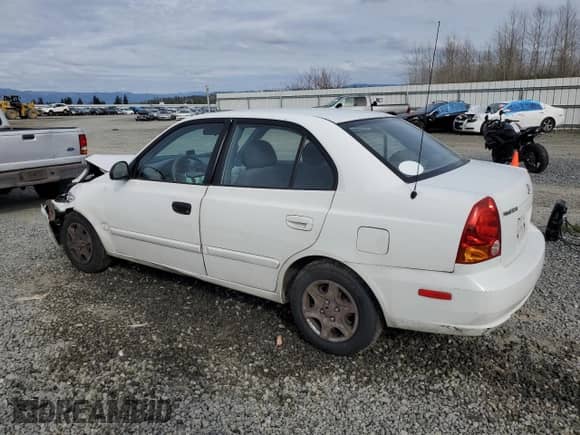 2003 Hyundai Accent GL z VIN KMHCG45C63U485420, wystawiony jako Copart lot #48251265 z przebiegiem 139 179 mil mil oraz Szkoda całkowita • Salvage title. Historia ofert i sprzedaży dostępna na DreamBid. Obrazek 2.