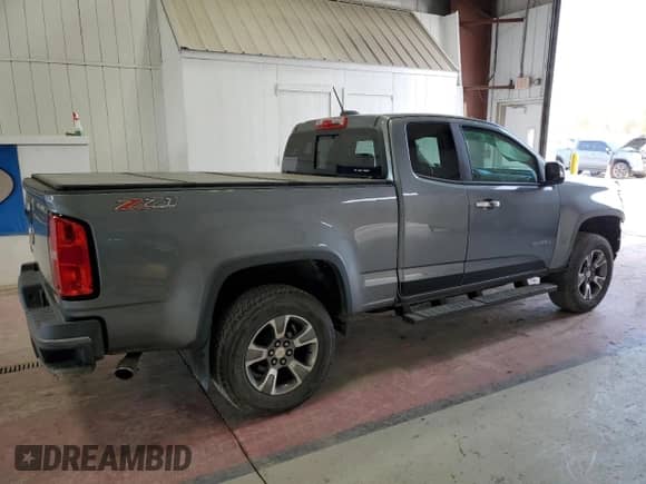 2018 Chevrolet Colorado 4WD Z71 with VIN 1GCHTDEN1J1284367, listed as a Copart auction lot 77316824 with 43,383 mi miles and Salvage title. Bid and sale history available at DreamBid. Image 3.
