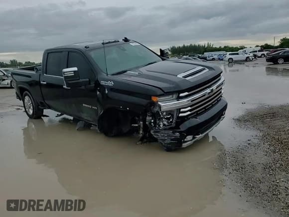 ✅ 2020 Chevrolet Silverado 2500HD High Country • VIN: 1GC4YREY0LF313628 • Лот: 82348425. Опубликован ранее на Copart с пробегом 84 165 миль. Бесплатный доступ к архиву аукционных продаж из США и подробный отчёт об истории автомобиля на DreamBid. Изображение 13.