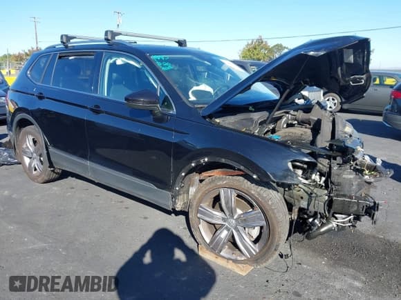 ✅ 2021 Volkswagen Tiguan SE • VIN: 3VV2B7AX1MM075768 • Lot: 43486395. Wystawiony na IAAI z przebiegiem 49 298 mil. Bezpłatny archiwum sprzedaży aukcyjnych z USA i szczegółowy raport historii pojazdu na DreamBid. Zdjęcie 1.