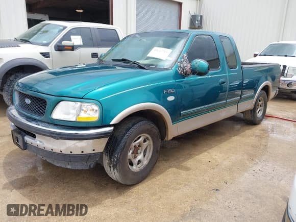 ✅ 1997 Ford F-150 • VIN: 1FTDX1761VKD08304 • Lot: 42643750. Listed on IAAI with 126,247 mi. Free auction sales archive from the USA and detailed vehicle history report at DreamBid. Image 2.