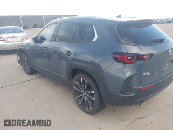 ✅ 2023 Mazda CX-50 S Premium Plus • VIN: 7MMVABEM0PN106956 • Лот: 43082881. Опубликован ранее на IAAI с пробегом 19 807 миль. Бесплатный доступ к архиву аукционных продаж из США и подробный отчёт об истории автомобиля на DreamBid. Изображение 3.