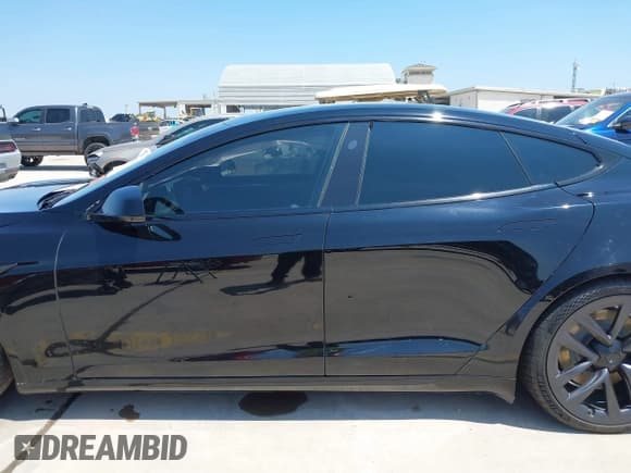 ✅ 2021 Tesla Model S Plaid • VIN: 5YJSA1E65MF439632 • Lot: 43166263. Listed on IAAI with 38,565 mi. Free auction sales archive from the USA and detailed vehicle history report at DreamBid. Image 14.