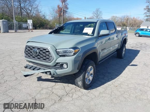 ✅ 2022 Toyota Tacoma TRD Off Road • VIN: 3TYDZ5BN1NT015418 • Lot: 43649466. Listed on IAAI with 58,704 mi. Free auction sales archive from the USA and detailed vehicle history report at DreamBid. Image 2.